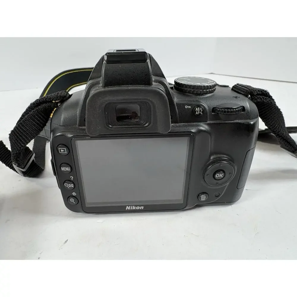 Nikon D3000 DSLR Camera Body EN-EL9 Battery Charger Strap Tested No Lens Kit